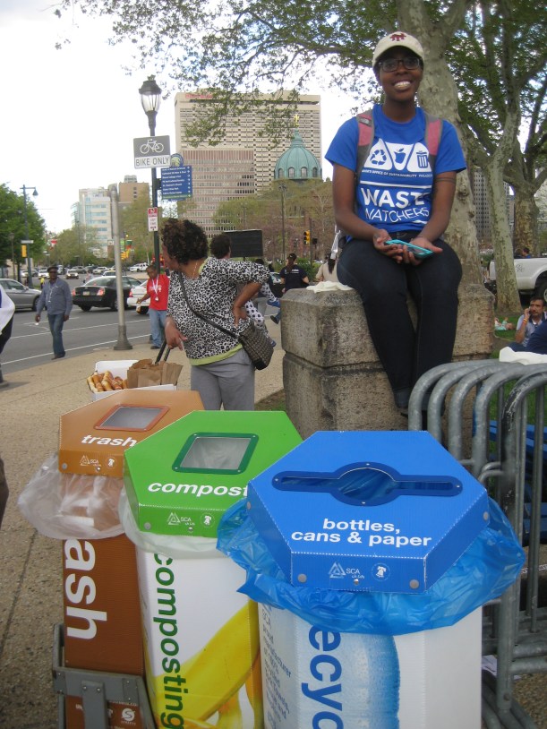 A Waste Watcher volunteer hangs out at a station during Science Carnival